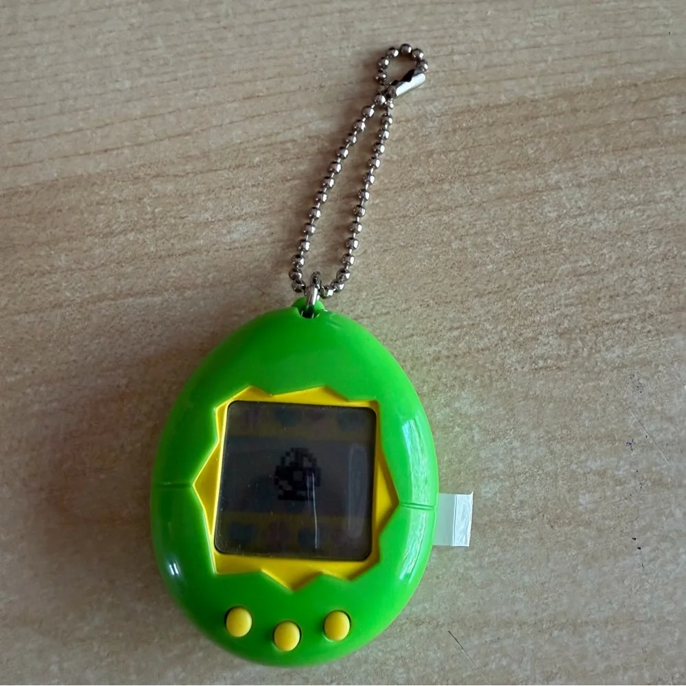 Bandai Tamagotchi Tamagocchi Bright Green Egg Digital Pet Keychain Yellow Green